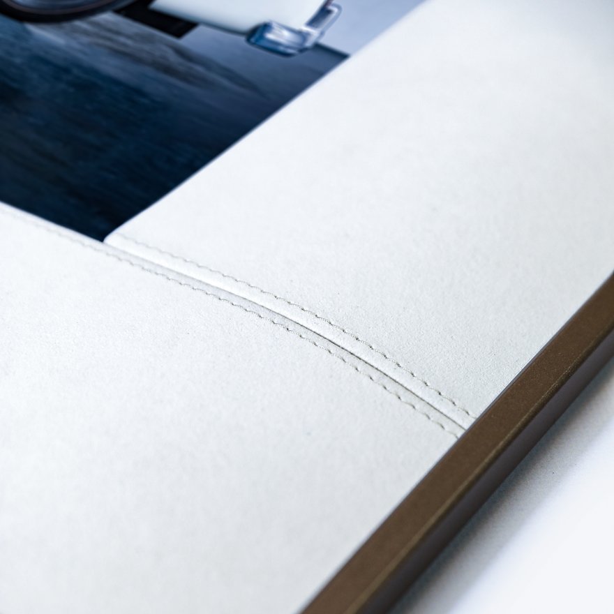 Close-up of an epaper frame material edge, matboard, and display surface