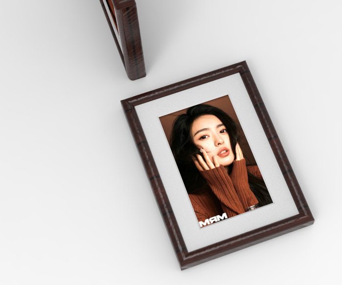 E paper picture frame in dark wood displaying a warm portrait photo