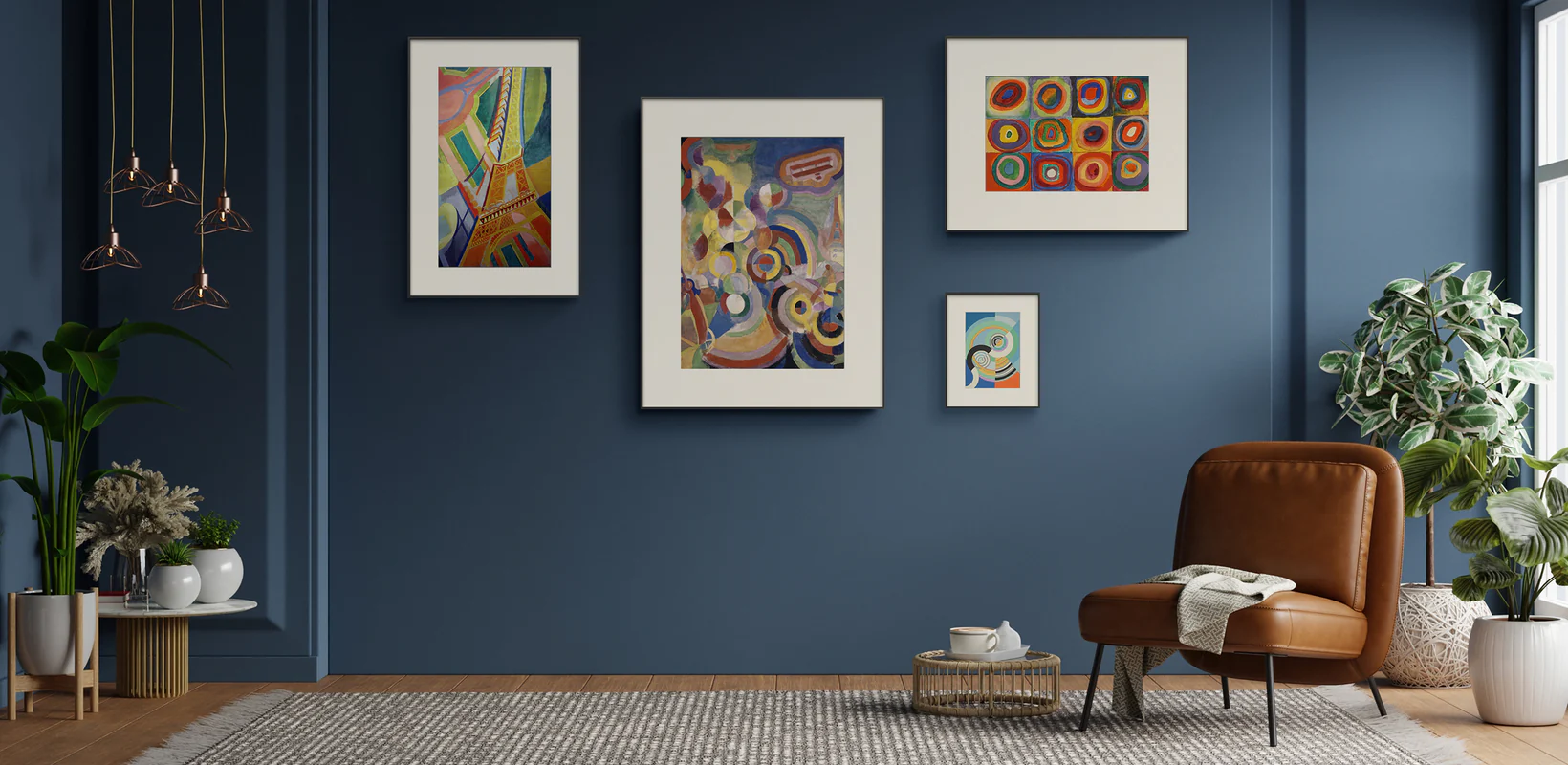 Coordinated gallery wall of color E-Ink artwork in a blue interior